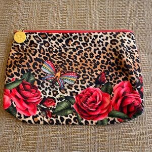 Estée Lauder animal print make up bag.        NWOT